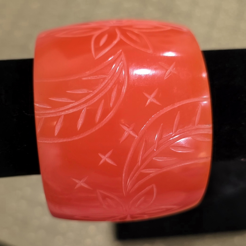Vintage Carved Orange Bangle Bracelet with a Floral Pattern - Picture 3 of 4